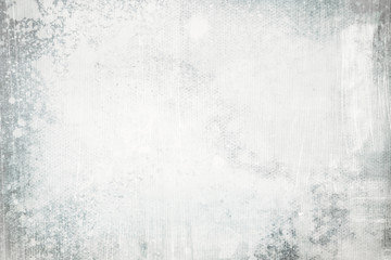 Splattered white  paint on canvas grungy background or texture