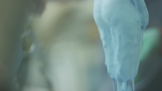 wax drying on mold as artisans prepare to work on it