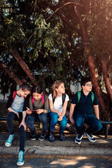 School kids hang out at schoolyard