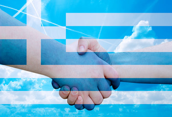 Gesture made by the flag Greece with colored hands showing friendship and greeting with two male...