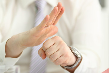 Obraz premium Male arms articulating during conference conversation in office closeup. Suggestion illustrate offer proposition bribe demand concept