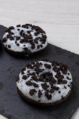 Donuts on stone background, close-up