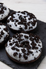 Donuts on stone background, close-up
