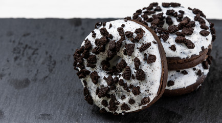 Donuts on stone background, close-up