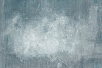 Blue distressed wall grungy background with spotlight background