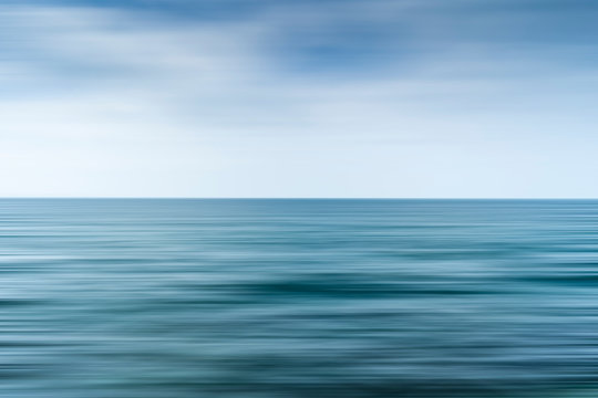 Long exposure shot of clouds over the sea