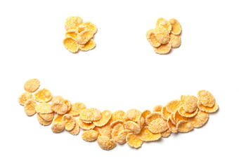 Yellow corn flakes symbol face with smile isolated on white background