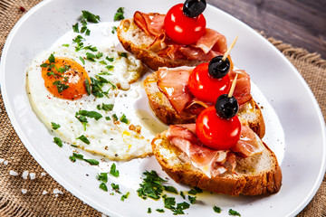 Breakfast - fried egg and sandwiches