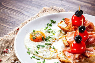 Breakfast - fried egg and sandwiches