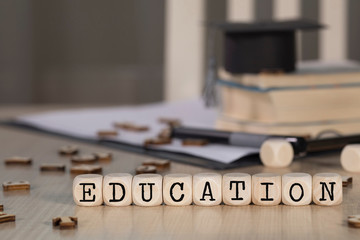 Word EDUCATION composed of wooden dices.