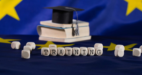 Word TRAINING composed of wooden letters.