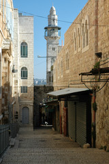 Minaret seen on narrow street in Christian Quarter of old Jerusalem