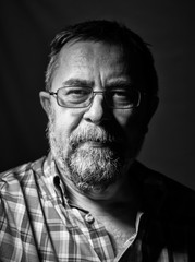 Beard elderly man in glasses