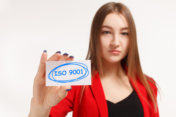 Business, technology, internet and networking concept. Young entrepreneur showing keyword: ISO 9001