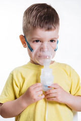 small child treats bronchitis inhaler at home