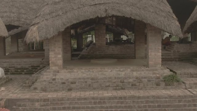 Traditional India eco-building school. Mayapur, India. 4k aerial ungraded