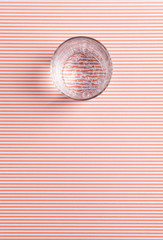 glass of water on red stripes background, Top view with space for text, mockup for healthy concept. web banner with copyspace