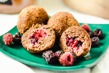 Sweet Chocolate Balls in Bucket for Rawfoodist. Yummy Natural Healthy Truffles with Cocoa Powder. Vegan Food Dessert Concept. Close-up.