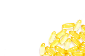 Omega 3 fish oil capsules on white background. Concept of healthcare. Top view, flat lay, copy...