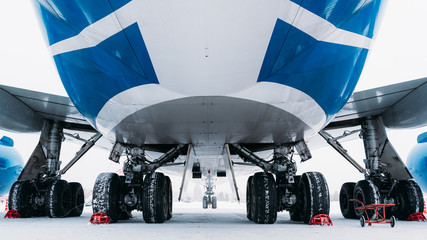 Chassis cargo aircraft Boeing 747. Airport In winter.