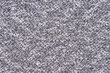 Gray wool background with patterns. Grey woolen fabric texture