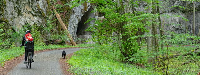Obraz premium Cyclists in the Moravian Karst near Punkrevi caves - Brno region, Czech Republic