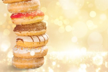 Delicious glazed doughnuts isolated on white background