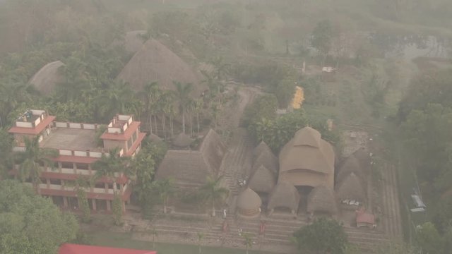 Traditional India eco-building school. Mayapur, India. 4k aerial ungraded