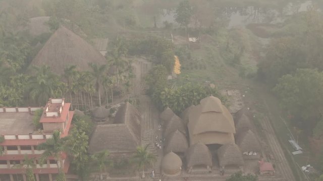 Traditional India eco-building school. Mayapur, India. 4k aerial ungraded