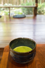 Bowl of hot matcha green tea drink
