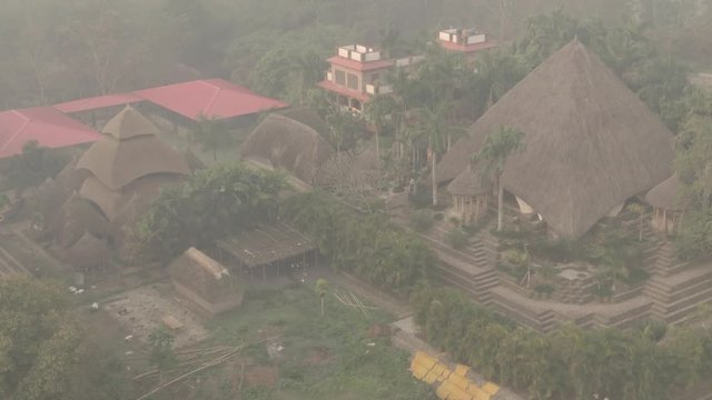 Traditional India eco-building school. Mayapur, India. 4k aerial ungraded