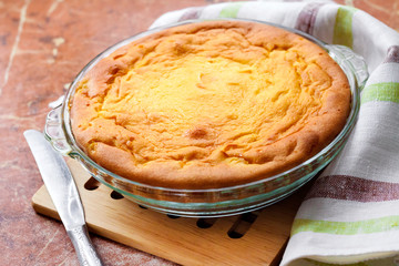 Sweet cottage cheese casserole in glass baking dish