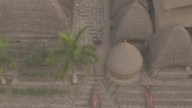 Traditional India eco-building school. Mayapur, India. 4k aerial ungraded