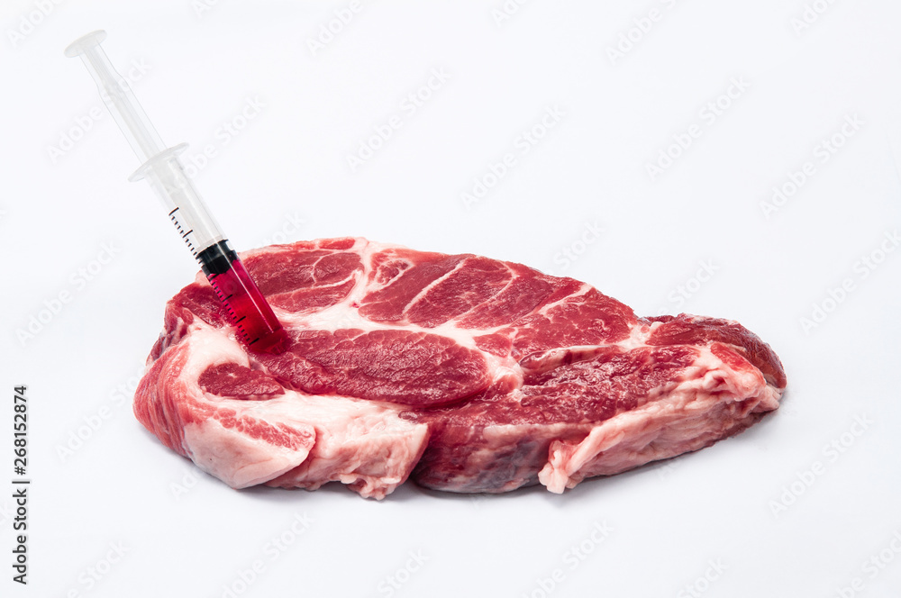 Wall mural hormone or antibiotic contaminated meat - injecting chemical into meat with syringe