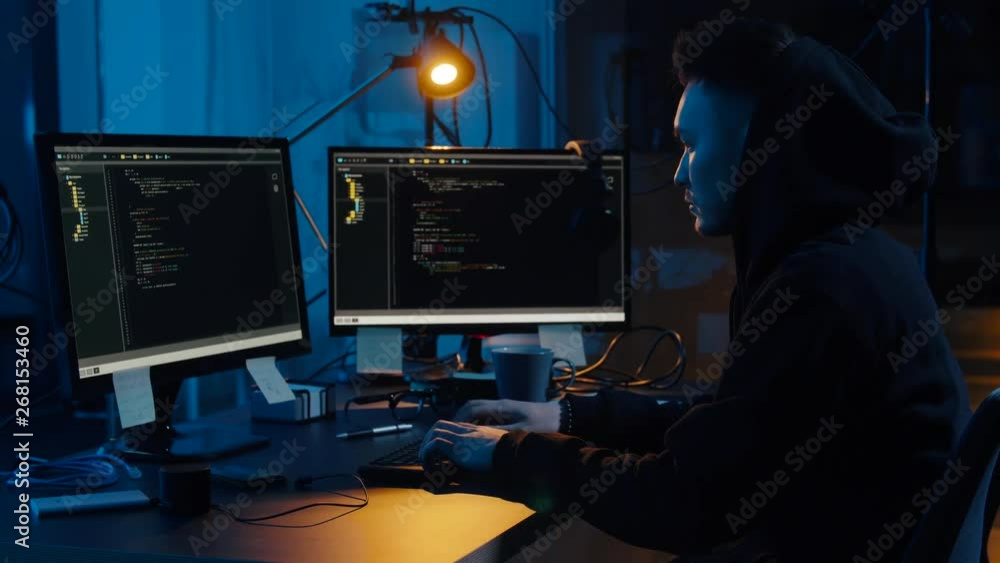 Poster cybercrime, hacking and technology concept - asian male hacker using computer virus program for cybe