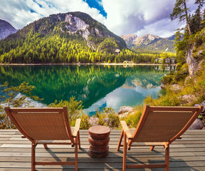 Pair of  sun loungers on the lake