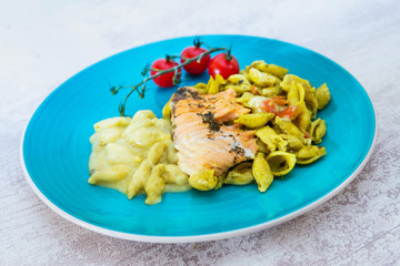tasty pasta with salmon on a the table