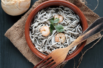 Gulas with garlic and prawns