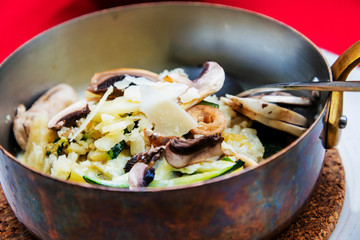 risotto with fresh cream, salted chicken, rehydrated ceps and mushrooms