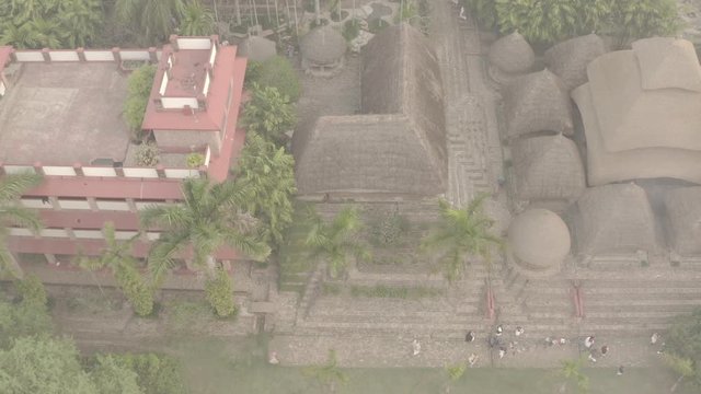 Traditional India eco-building school. Mayapur, India. 4k aerial ungraded