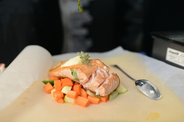 Making dinner at restaurant. Proffesional cooker