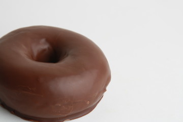 chocolate bagel on white background