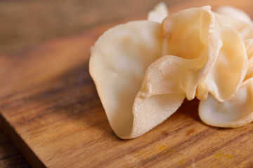 fresh Jew's ear, Wood ear, Jelly ear white mushroom on wooden cutting board