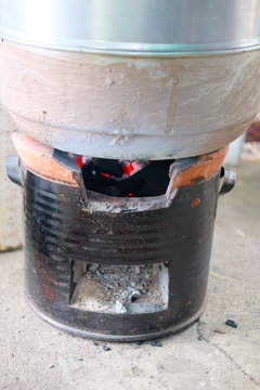 Steamer located on a hot charcoal stove