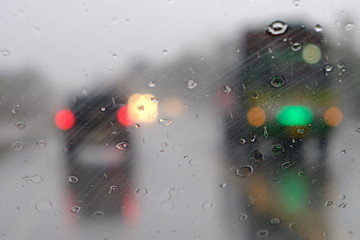 Raindrops on the car glass.