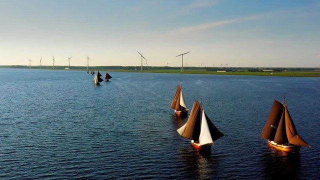 Aerial of typical Dutch blunter ships in a contest nearby village Spakenburg, The Netherlands