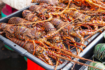 Catch of lobsters lay on counter