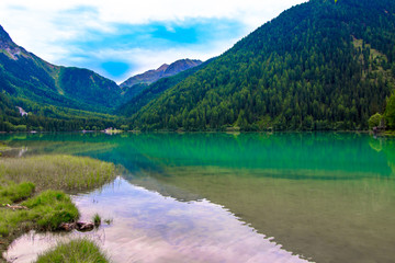 Fototapeta premium The Antholzer See a lake in South Tyrol, Italy