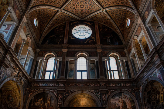 Italy, 03/28/2019: the interior of San Maurizio al Monastero Maggiore, 1518 church known as the Sistine Chapel of Milan, details of the chapels in the faithful's area with frescoes by Aurelio Luini