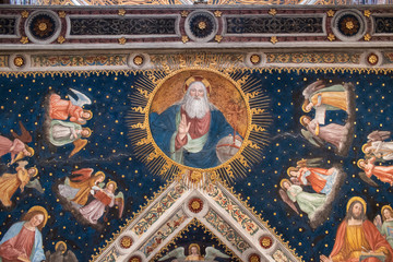 Italy, 28/03/2019: San Maurizio al Monastero Maggiore, a 1518 church known as the Sistine Chapel of Milan, details of the vault in the Hall of nuns with a starry sky, God, the Evangelists and angels